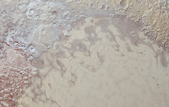 Illustration for article titled New, Insanely High-Resolution Pluto Images Include More Color—and Weird "Snakeskin" Textures